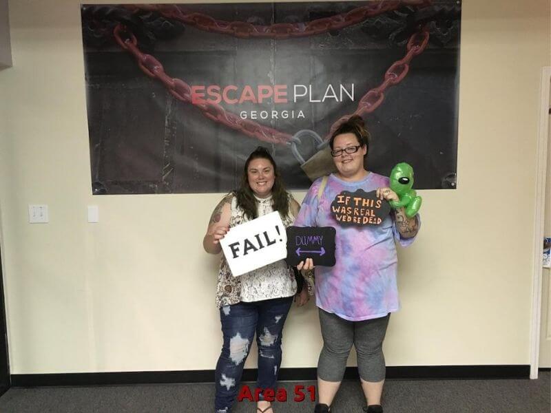 Two girls after they have failed to escape the room